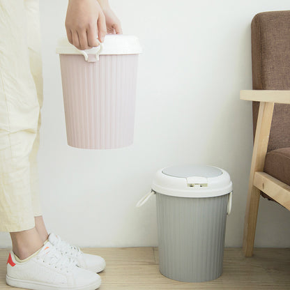 Clamshell trash can